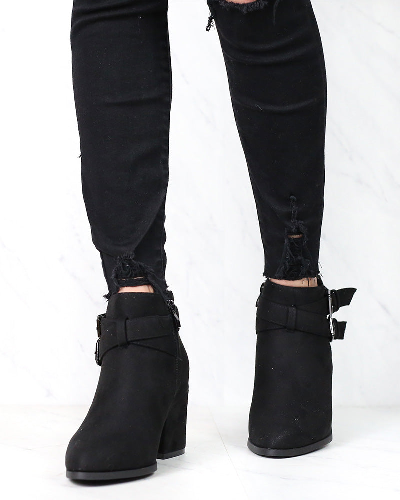 A Grand Entrance Faux Suede Ankle Bootie With Buckle Detail in More Colors