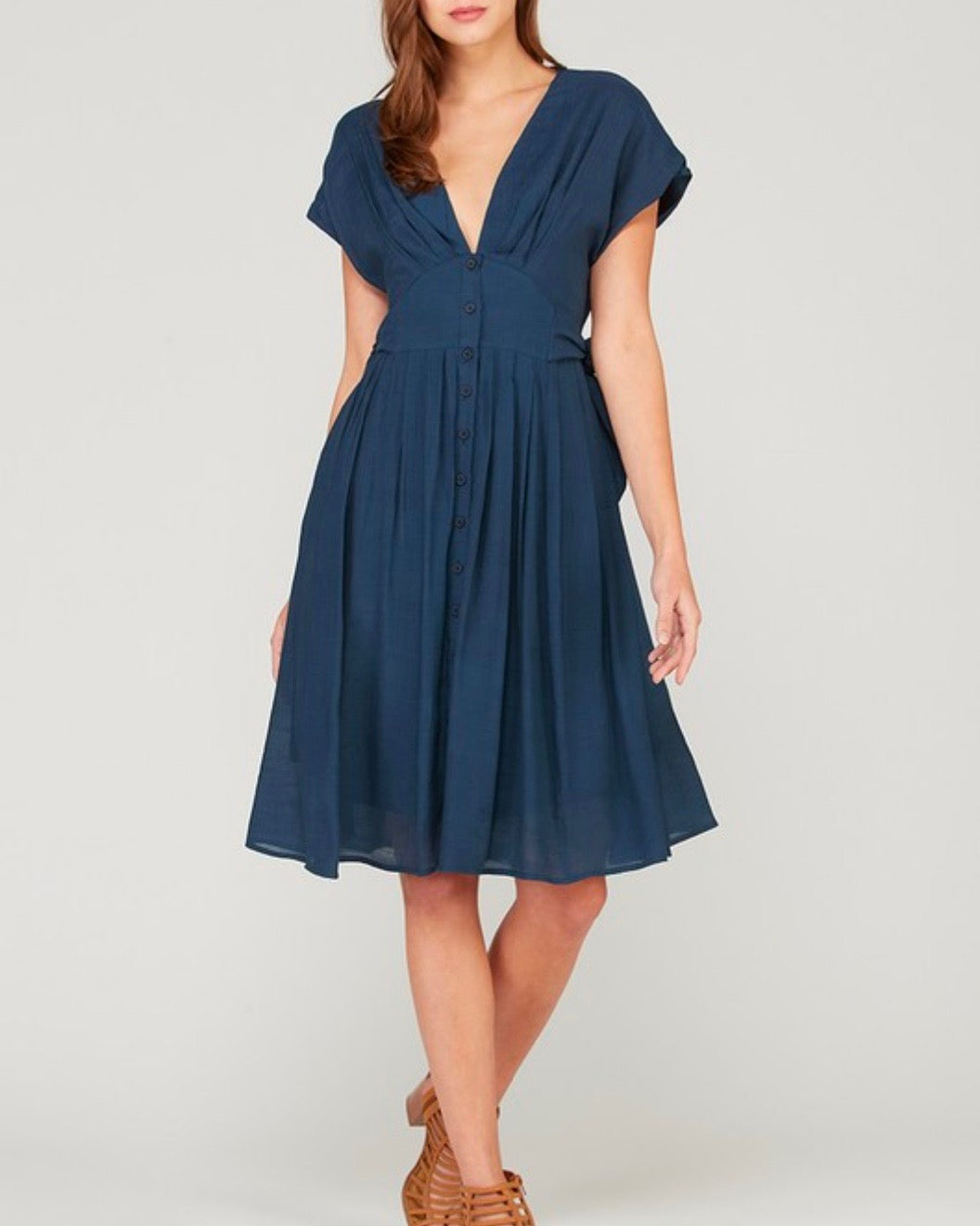 In The Air Woven V-Neck Button Down Empire Waist Dress in Navy Shop Hearts In The Air Woven V-Neck Button Down Empire Waist Dress in Navy Shop Hearts