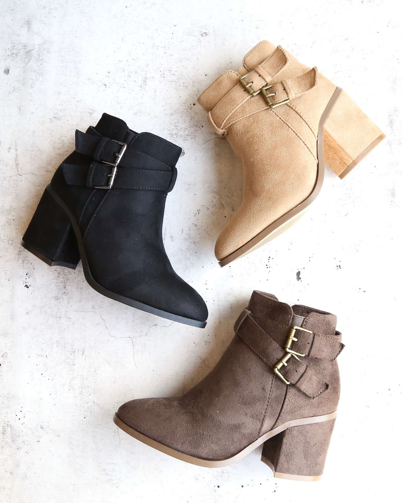 A Grand Entrance Faux Suede Ankle Bootie With Buckle Detail in More Colors