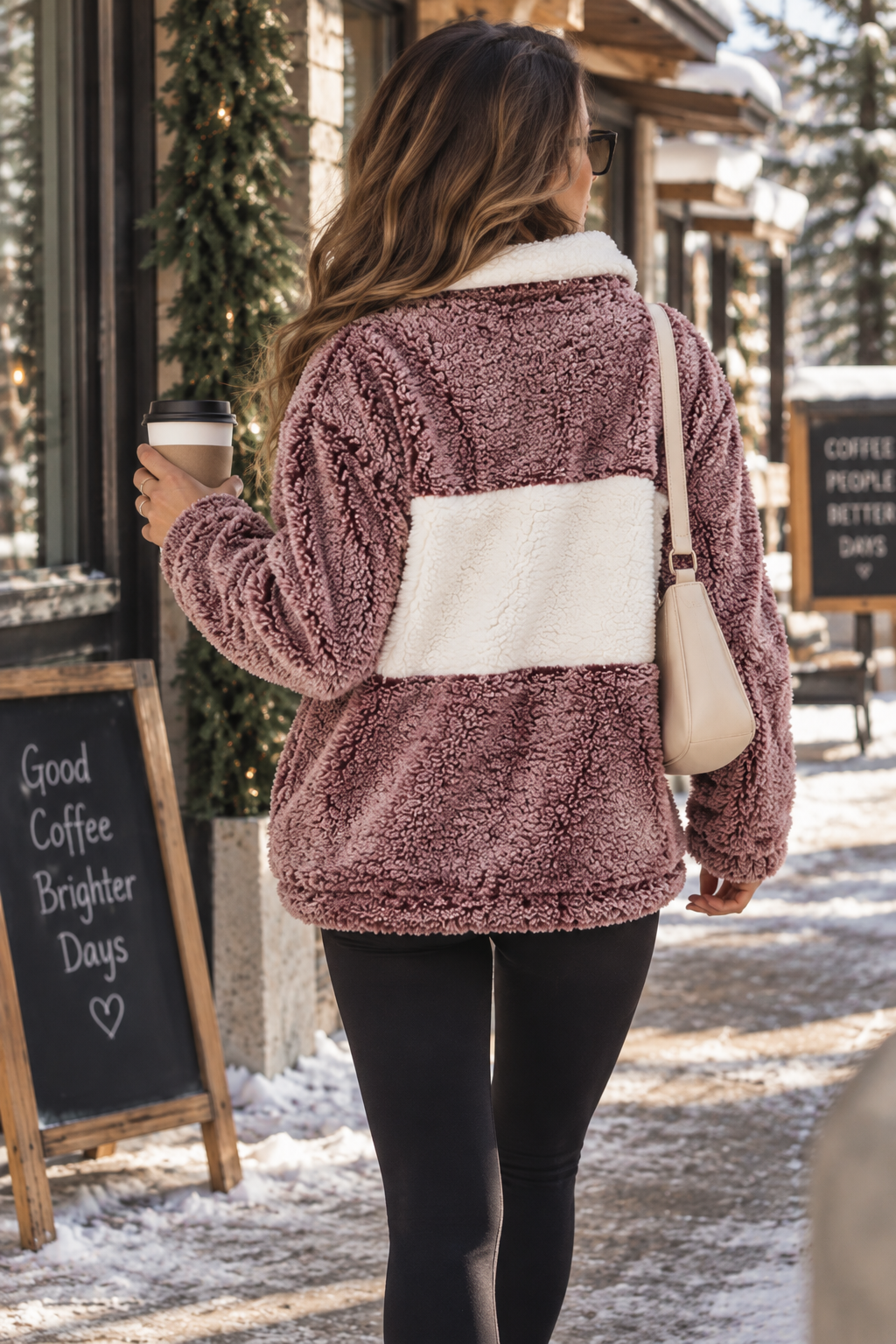 Back view of women's burgundy sherpa pullover with contrasting ivory colorblock panel and plush textured fleece