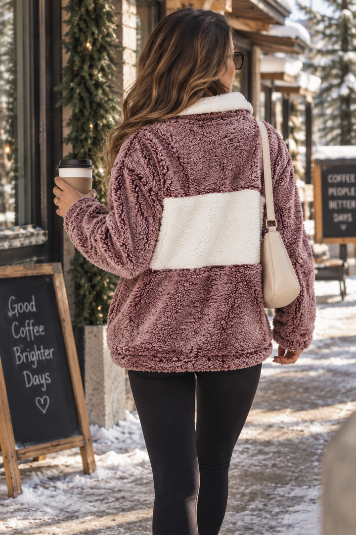 Back view of women's burgundy sherpa pullover with contrasting ivory colorblock panel and plush textured fleece