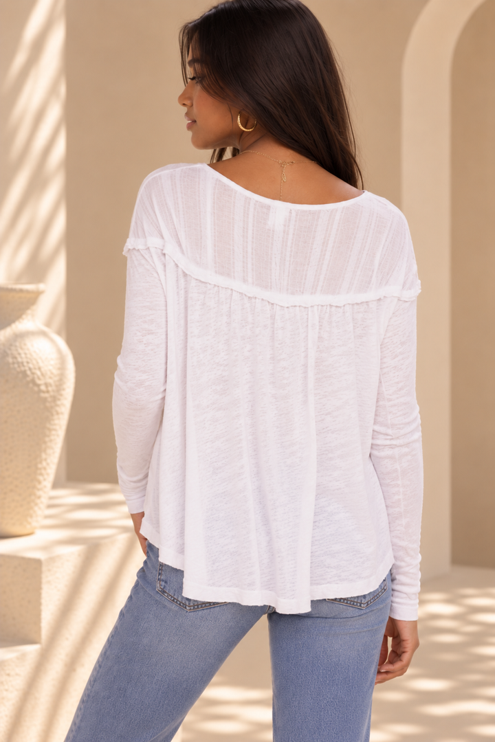 Free People Down Under Henley Thermal Top in white back view with semi sheer textured yoke and flowy silhouette