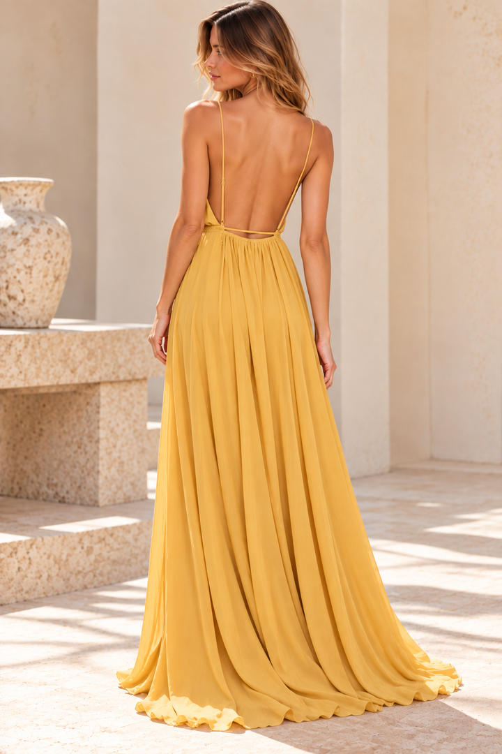 Honey Punch Summer Affair gold maxi dress, back view showing very low neckline and thin straps