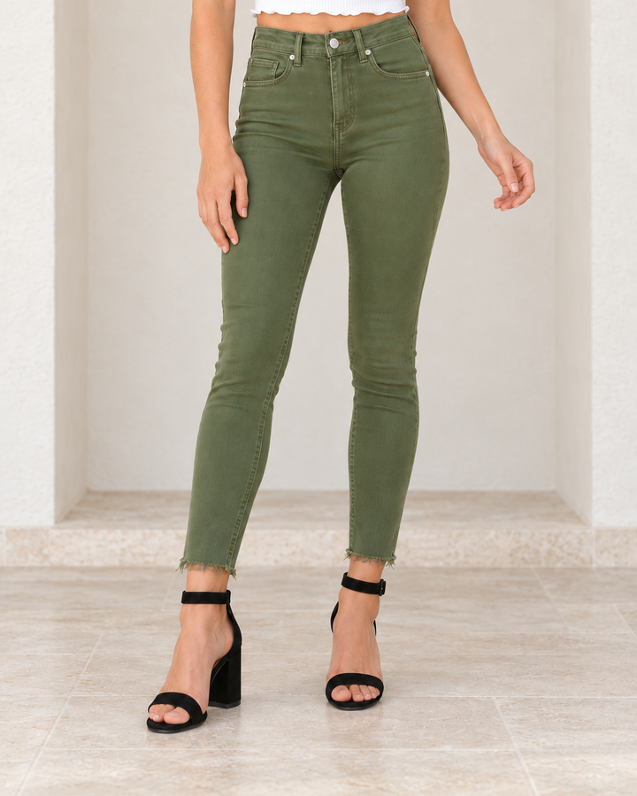 Raw Hem Skinny Jeans in army green, focused front view showing the waistband, pockets and complete raw hems.