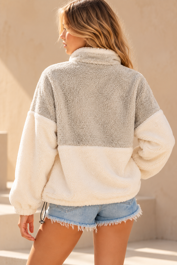 Back view of taupe and cream colorblock sherpa pullover
