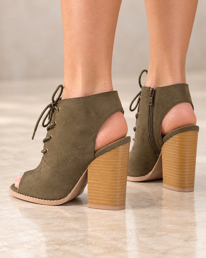 Khaki Adventure lace-up peep-toe booties worn on feet, rear three-quarter view