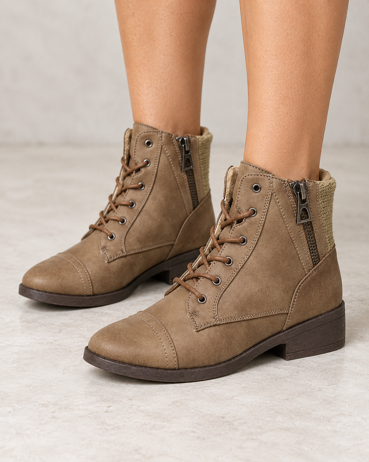 Brielle taupe ankle sweater booties, modeled front three-quarter view showing laces and side zippers