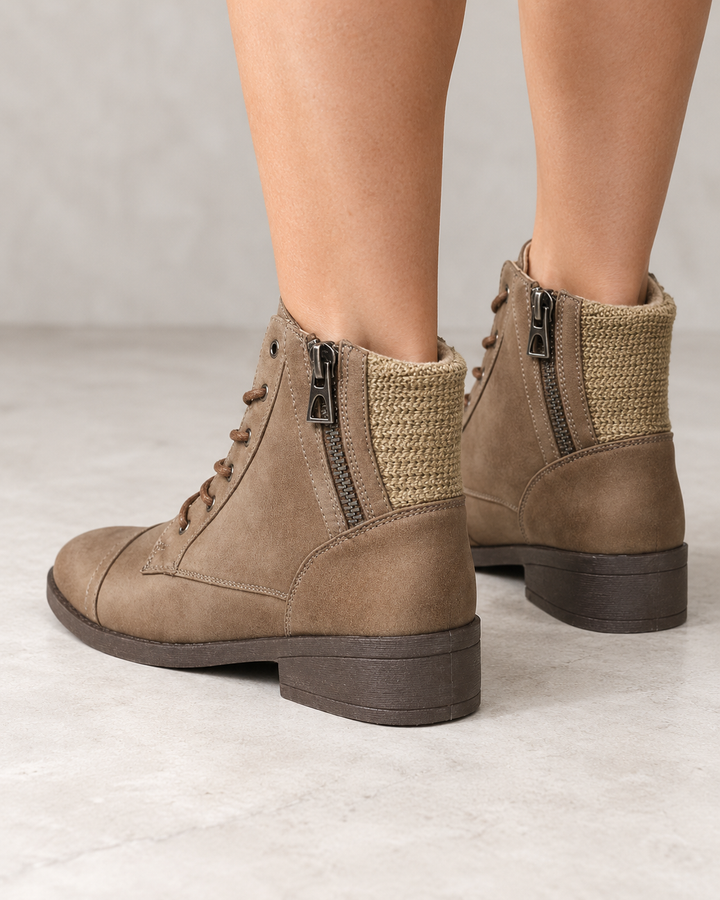 Brielle taupe ankle sweater booties, modeled rear three-quarter view showing knit back panels and low heels