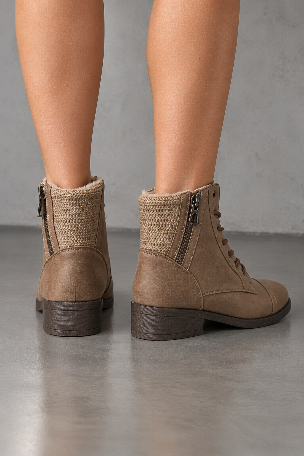 Brielle taupe lace-up ankle sweater booties with side zippers, back view worn on feet in a neutral studio.
