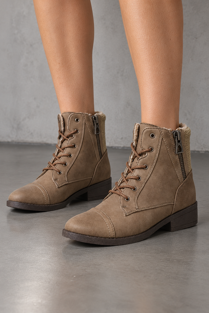 Brielle taupe lace-up ankle sweater booties with side zippers, front view worn on feet in a neutral studio.