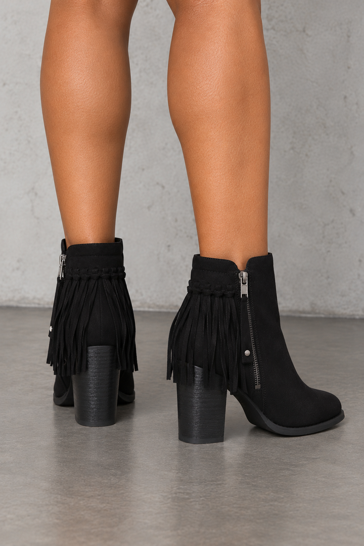 City Chic black fringe vegan-suede ankle boots, back view worn on feet in a neutral studio.