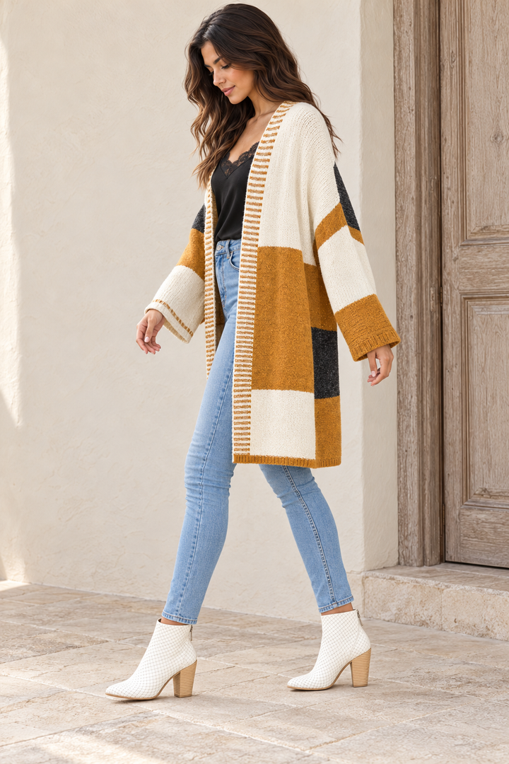 Side view of Long-Line Open-Front Mustard Color Block Cardigan on an adult model in warm natural light.