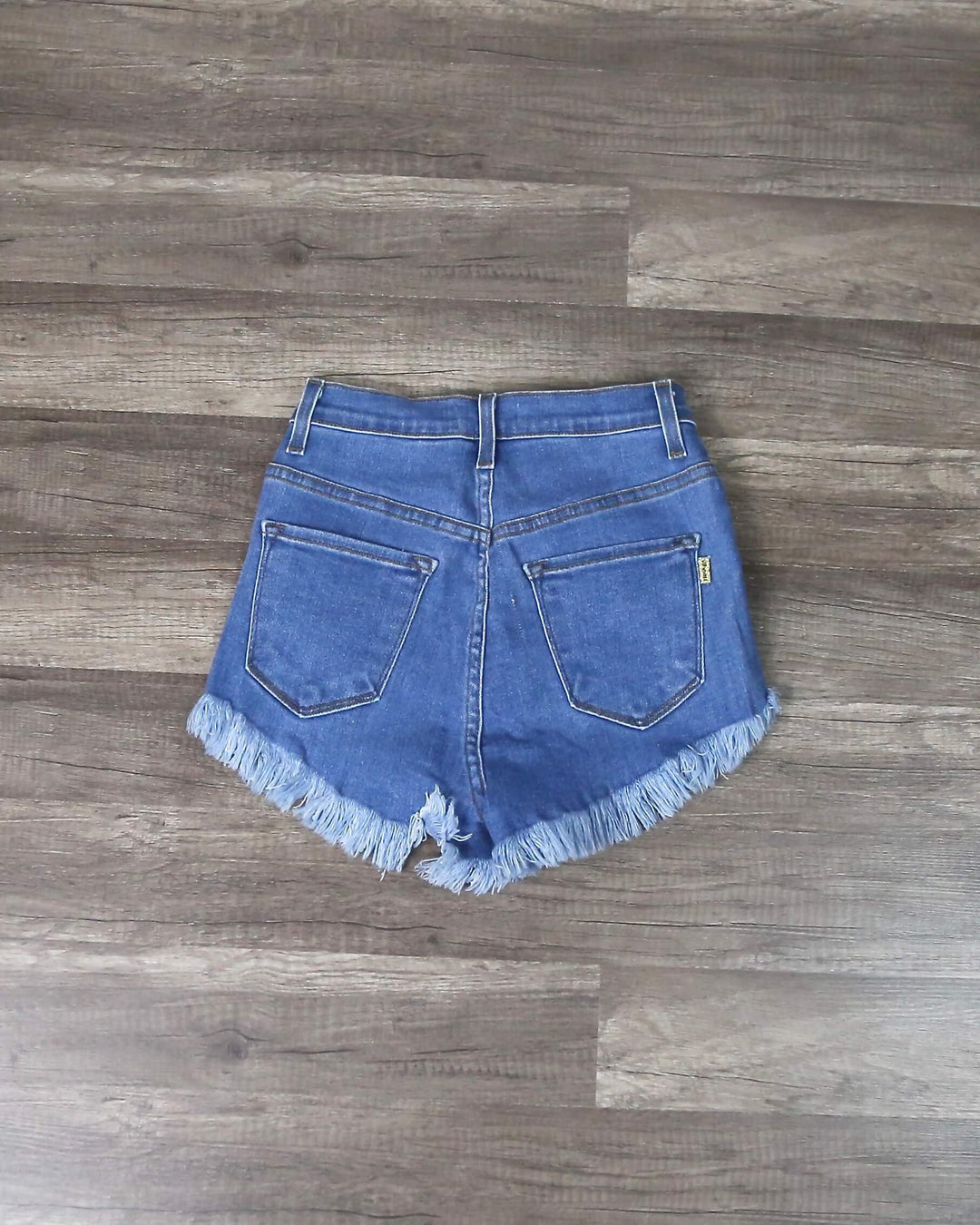 High Waisted Distressed Jean Shorts In Medium Wash