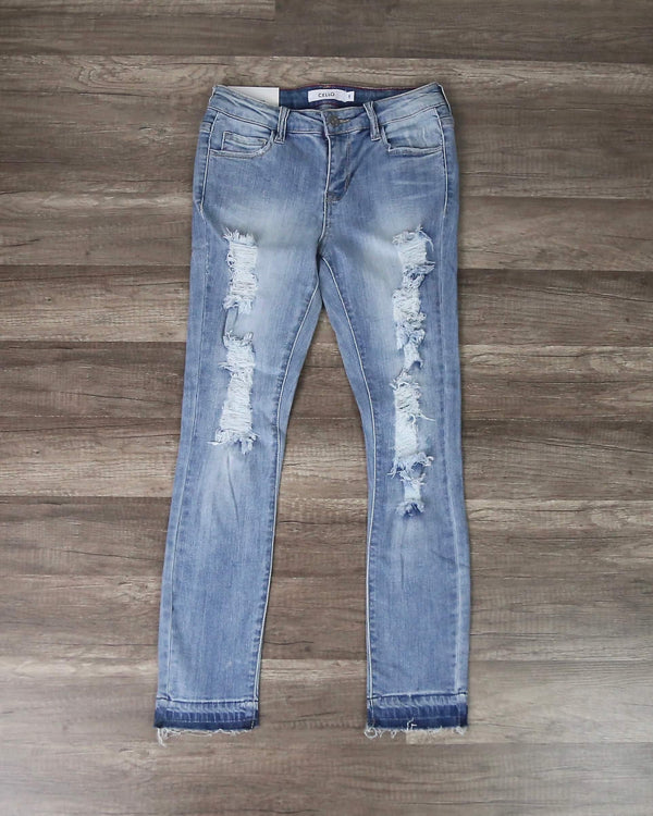 Distressed Cropped Light Denim Skinny Jeans With Frayed Hem