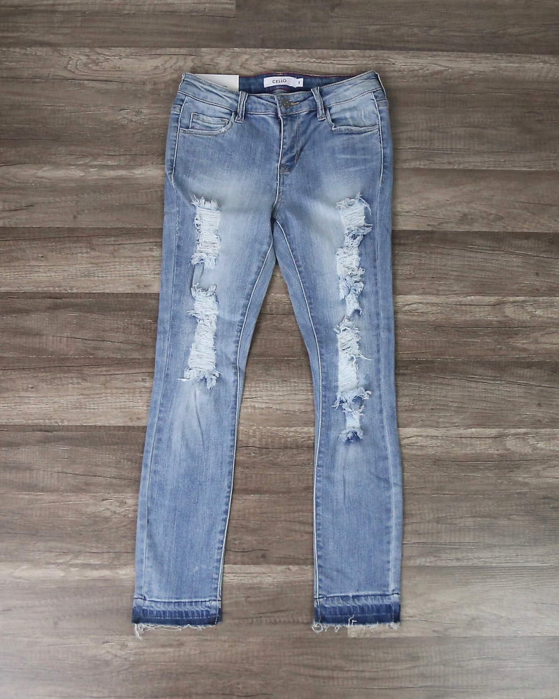 Distressed Cropped Light Denim Skinny Jeans With Frayed Hem