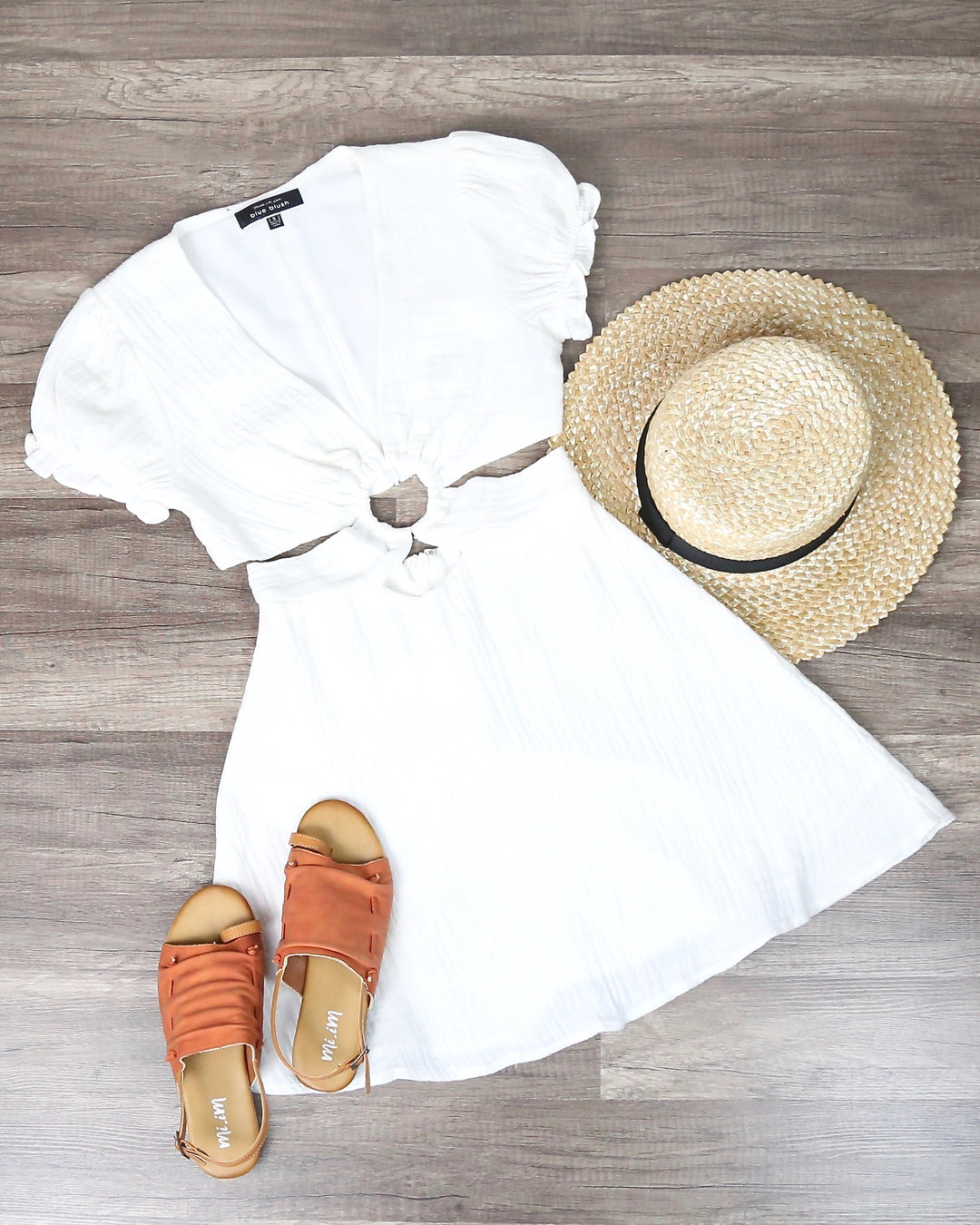white skater cut out dress White Skater Mini Dress with Cut-Out Waist For Women at UAE