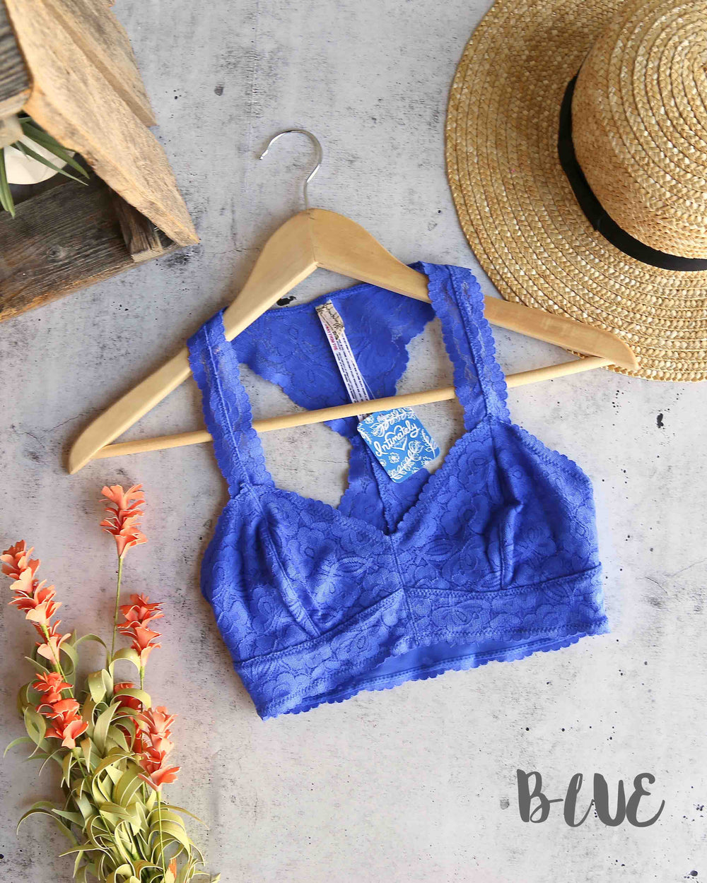 Free People Galloon Lace Racerback Bralette in blue featuring floral lace and wide lace straps