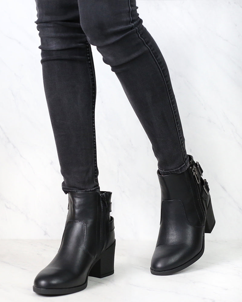 One More Dance Faux Leather Ankle Bootie with Buckle Detail in Black