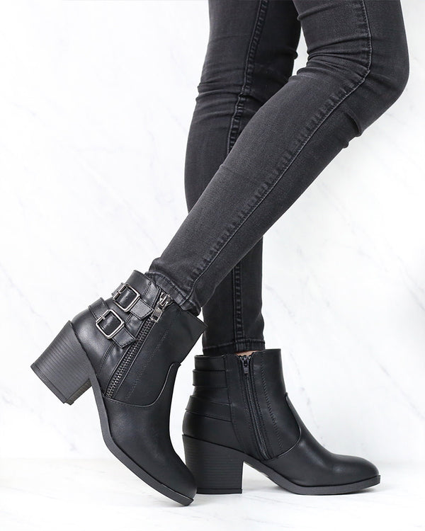 One More Dance Faux Leather Ankle Bootie with Buckle Detail in Black